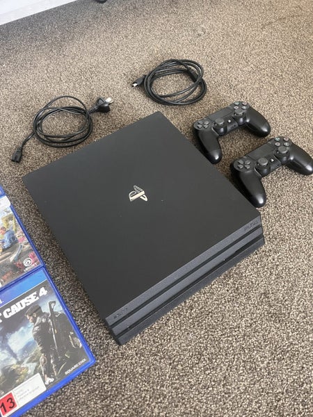 PS4 Pro 1TB + 12 Games + 2 Controllers Carousel 2