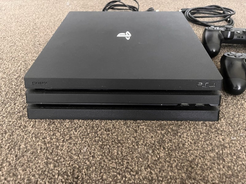 PS4 Pro 1TB + 12 Games + 2 Controllers Carousel 8