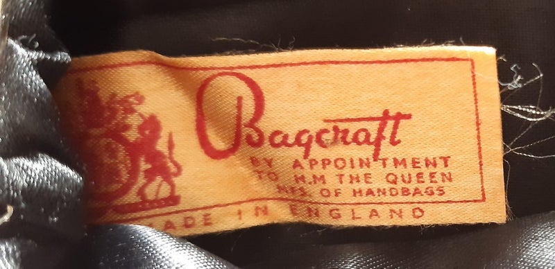 By appointment to H.M the Queen vintage bag Carousel 2