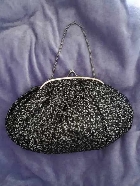 By appointment to H.M the Queen vintage bag Carousel 1