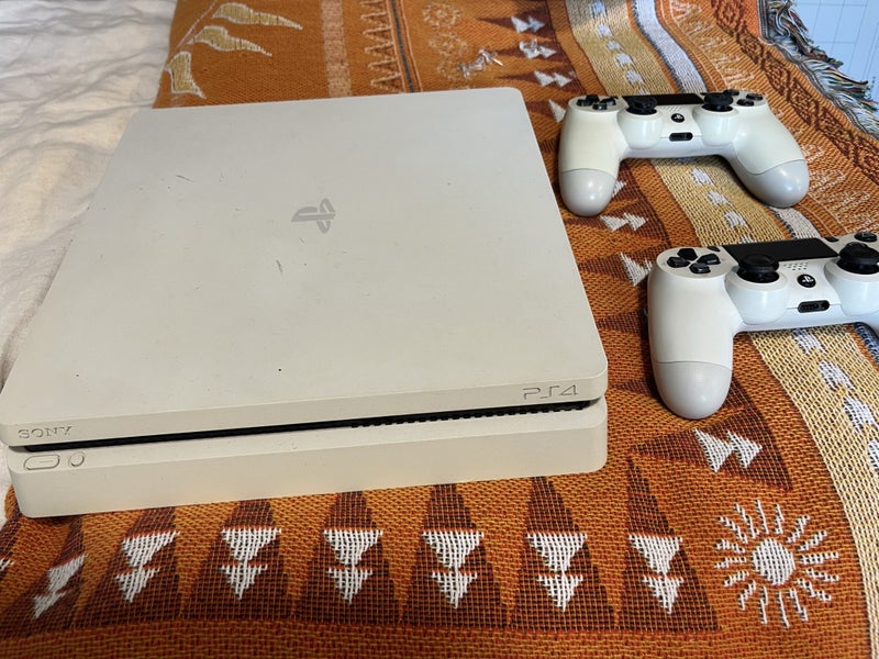 PS4 with 2x Controllers Carousel 2