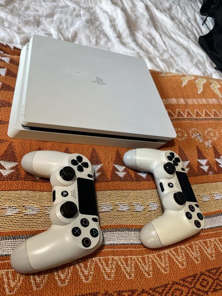 PS4 with 2x Controllers Carousel 1