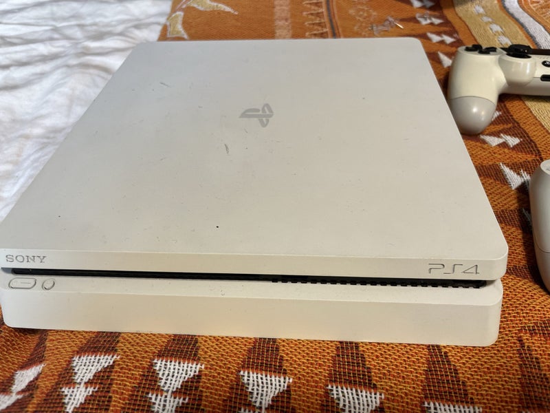 PS4 with 2x Controllers Carousel 3