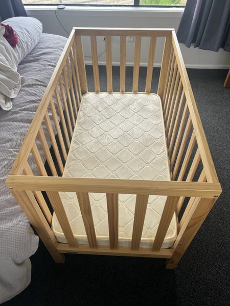 Near new baby cot and mattress Carousel 2