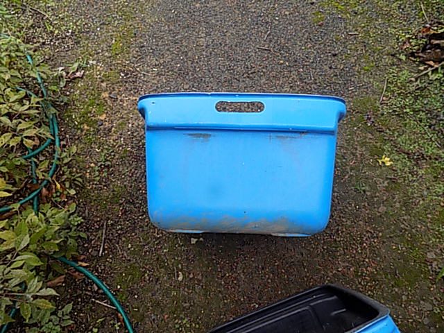 blue bins for scaffolding parts or potting mix storage or whatever Carousel 4