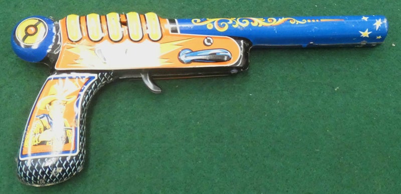 Vintage SPACE TOY Tinplate Litho RAY GUN with COWBOYS on Handle WEST GERMANY Carousel 1