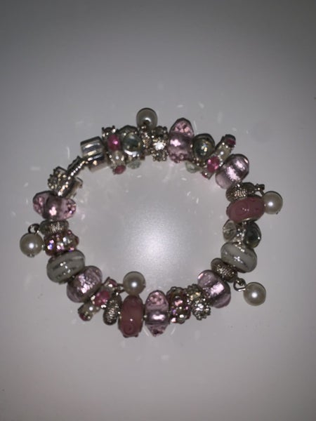 Pink bead and charm Pandora-like bracelet Carousel 1