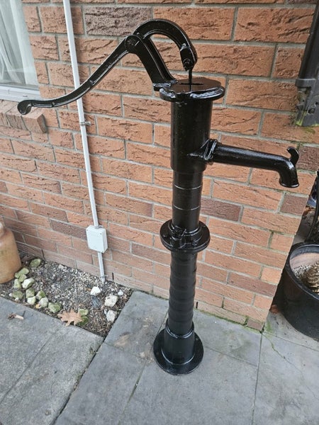 Old cast iron Vintage Water Pump Carousel 1