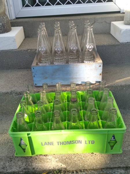 Vintage soft drink bottles with crates. Carousel 1