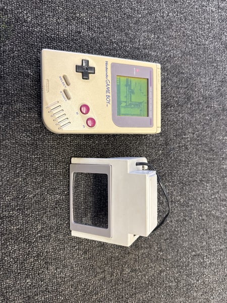 Nintendo Game Boy 1989 DMG01 With Magnifier Carousel 1