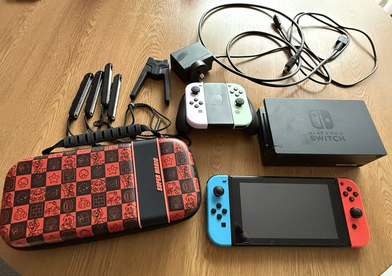 Nintendo Switch Console + Accessories Carousel 1
