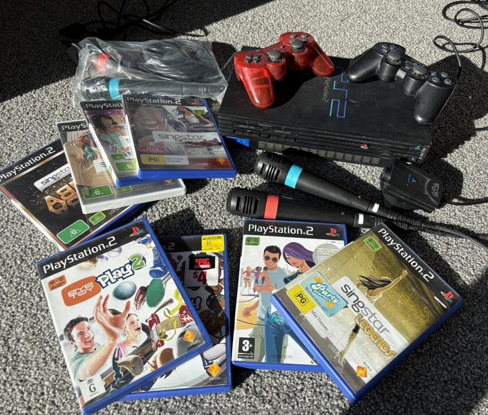 PlayStation 2 Bundle with Singstar and EyeToy Carousel 1