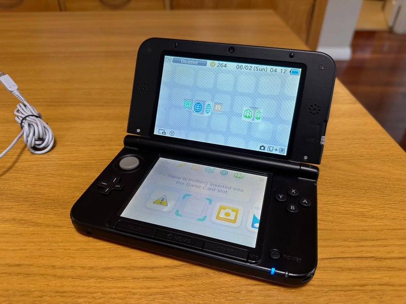 $1 Res - Nintendo 3DS XL Console (Red) + Genuine Power Adapter Carousel 2
