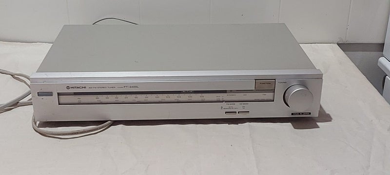 Hitachi FT-3400L. AM-FM Stereo Tuner Carousel 1