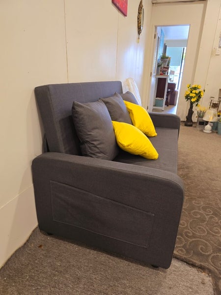 2 seater sofa bed with storage underneath $1 NR Carousel 2