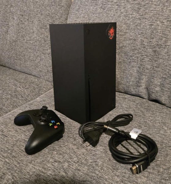 xbox series X and controller with some games Carousel 1