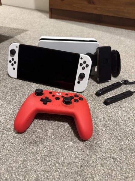Nintendo switch OLED - Includes Extra Controller Carousel 1