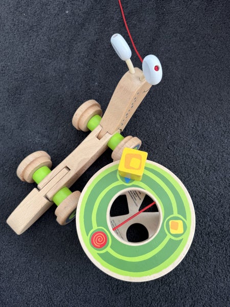Hape Walk Along Snail Toy Carousel 5