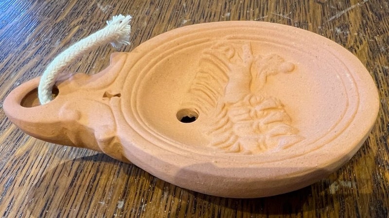 Working terracotta replica of Roman oil lamp Carousel 2