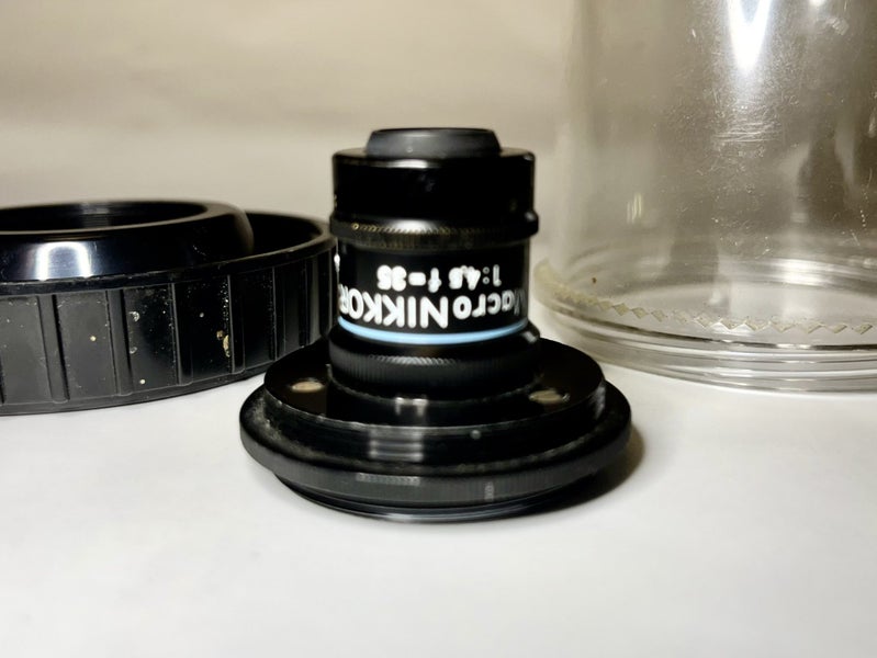 Macro Nikkor 35mm f4.5 ( + RMS to L39) contained in Nikon bubble case. Carousel 1