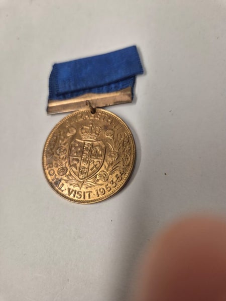 commemorative medal for Queen Elizabeth II's visit to New Zealand in 1953-54. Carousel 2