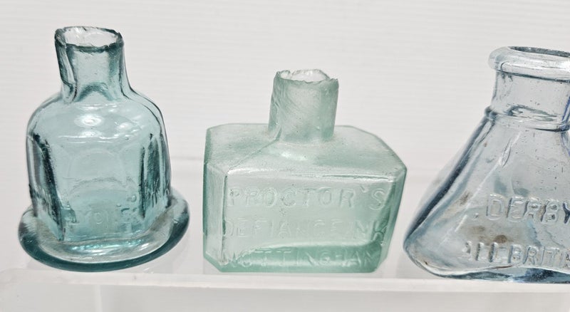 Collection of old Victorian embossed glass ink bottles Carousel 2