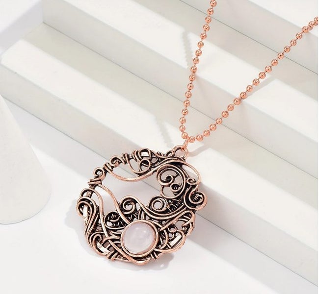VINTAGE MOONSTONE SUN AND MOON NECKLACE Carousel 1