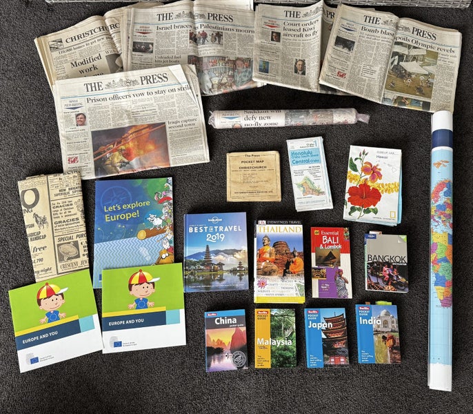 Vintage CHCH, Hawaii & World Map travel books and old newspapers Carousel 1