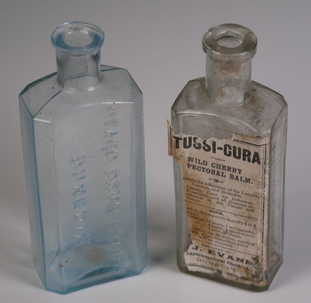 Two Dunedin Otago Chemist Bottles - One Rare Labeled Quack Cure Carousel 1