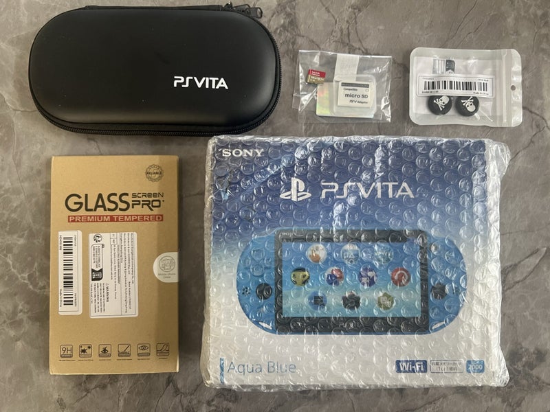 BRAND NEW PS VITA + 128GB SD CARD + MORE!! Carousel 1