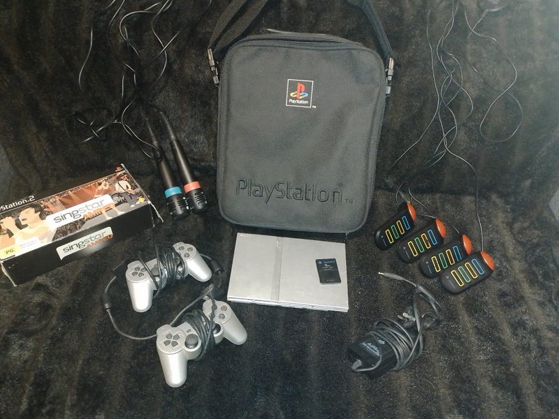 Retro Playstation2 bundle. Console controllers bag buzz singstar memory card Carousel 1