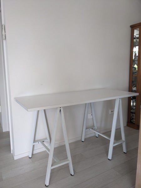 White trestle desk 1400L x 600W Carousel 1