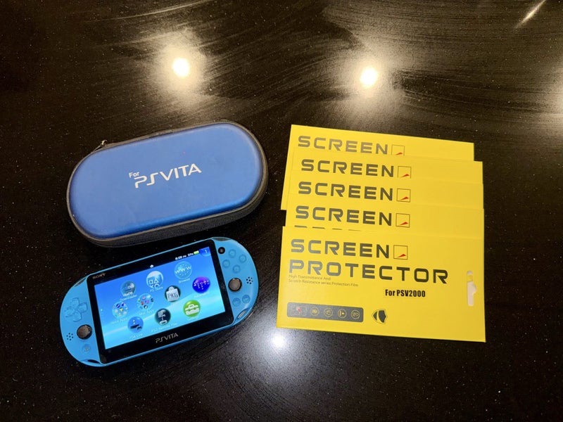 PS Vita Console Aqua Blue 512GB + Acessories Carousel 1