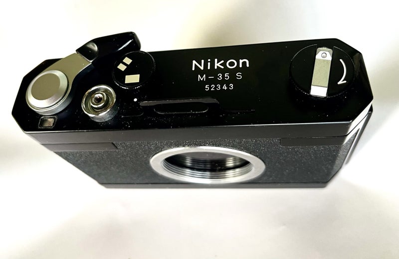 Nikon 35-S Microscope 35mm camera. Has also been used as a pinhole camera. Carousel 1