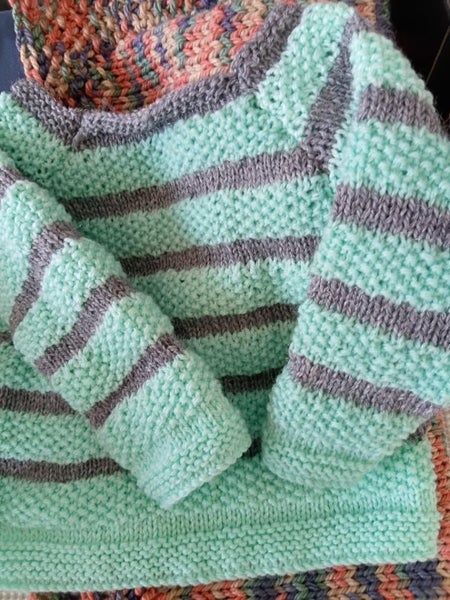 Kiddies HAND KNITTED Jumper Carousel 1
