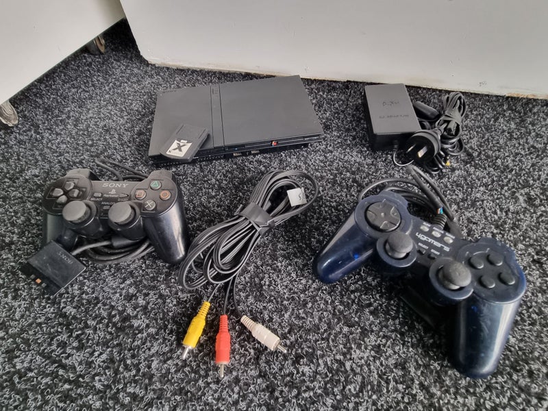 PS2 Slim Console, 2 Controllers, Memory card and Cables Carousel 1
