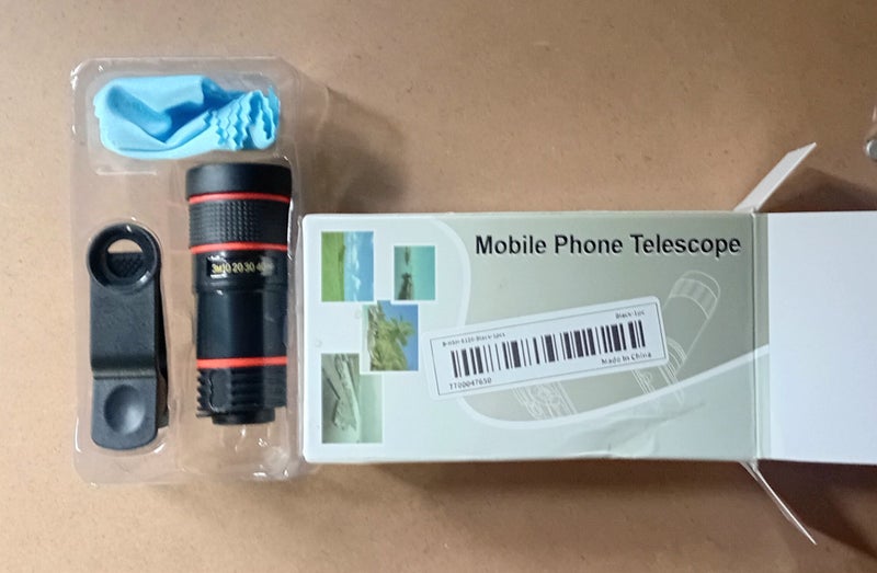 Universal Zoom Lens 8X Clip-On Carousel 1