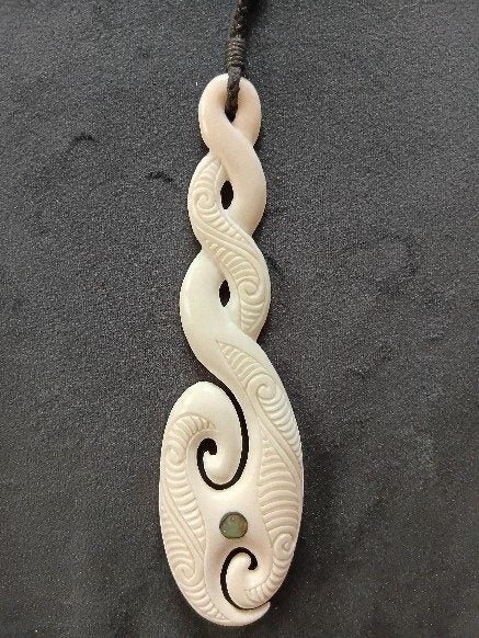 Bone Carving - Large Twist, with Koru, Pendant in Giftbox Carousel 1