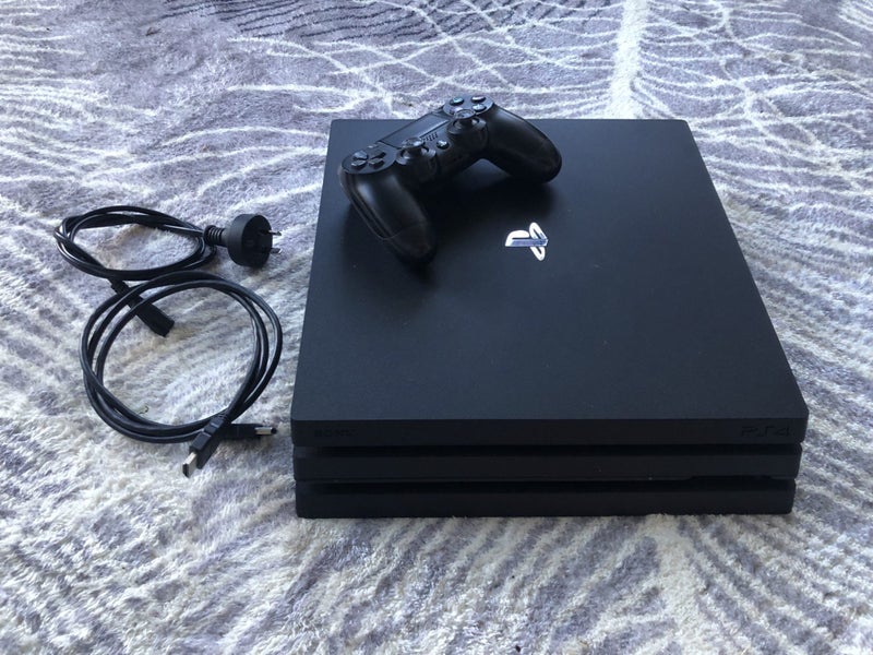 PlayStation 4 Pro | 2TB Hard Drive | With DualShock Controller Carousel 5