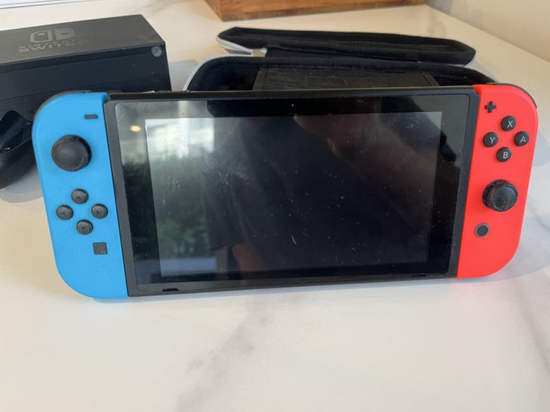 Nintendo Switch + Case and Micro SD Carousel 2