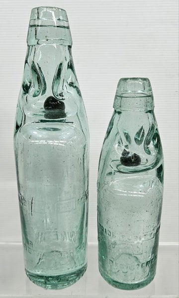 2 x Thomson & Co Dunedin codd coloured marble bottles Carousel 2
