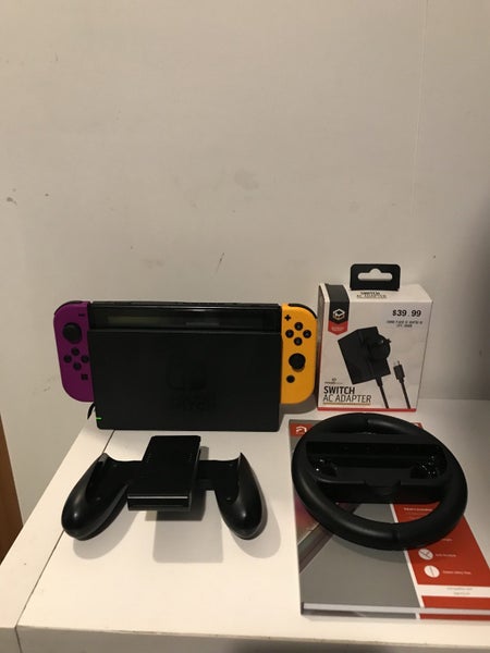 Nintendo switch + accessories Carousel 1