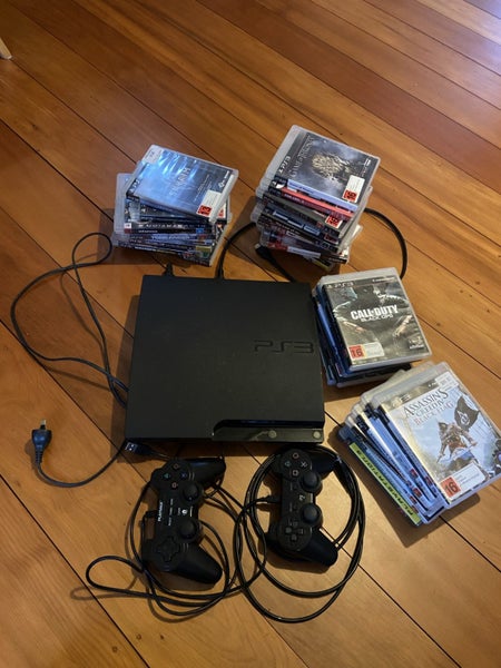 PS3 Slim 320gb console and games bundle Carousel 1