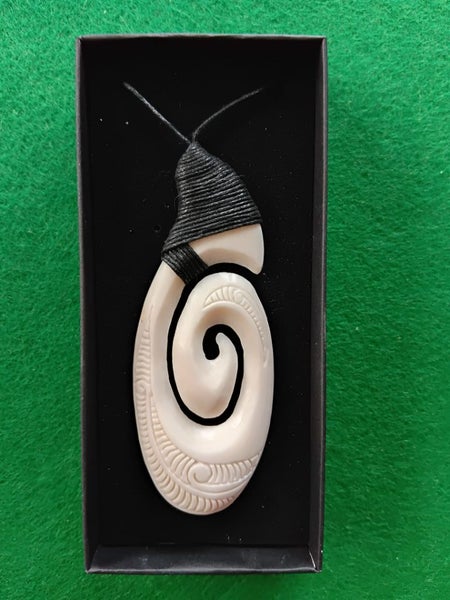 Medium Bone Carving Koru Pendant in Giftbox Carousel 2