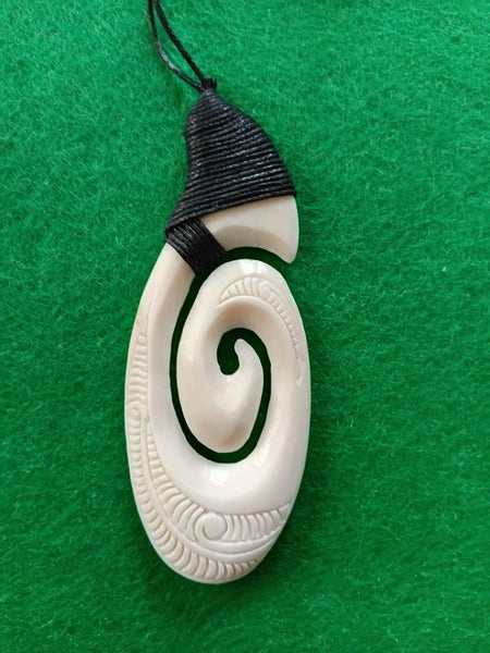 Medium Bone Carving Koru Pendant in Giftbox Carousel 1