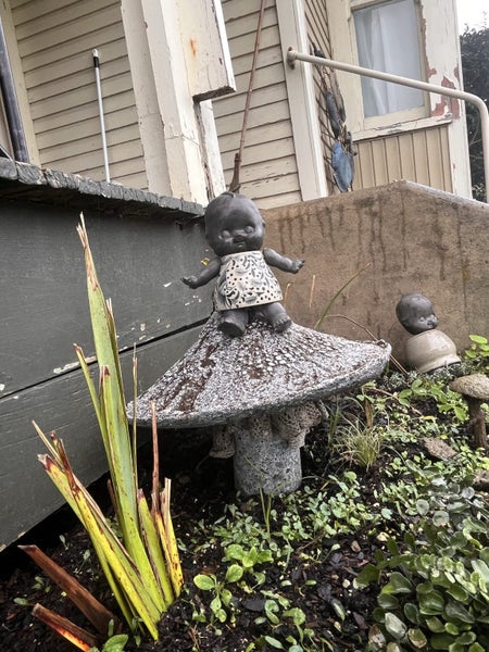 Articulated concrete kewpie doll teacup mushroom garden art Carousel 2