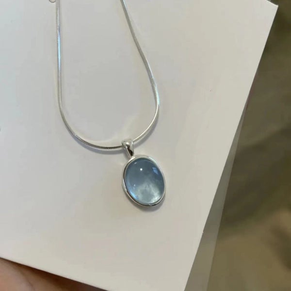 Misty Blue Oval Pendant Necklace Carousel 1