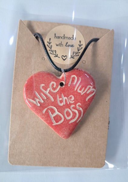 Handmade ceramic heart necklace. Carousel 1