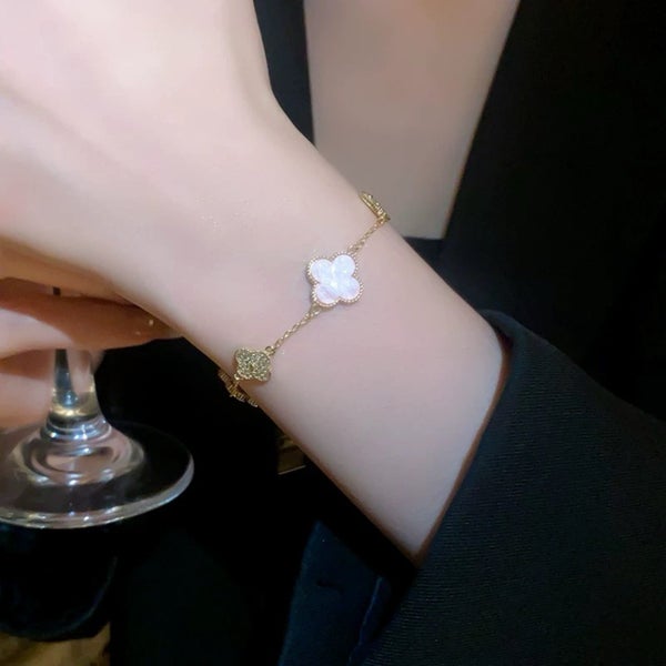 Four-Leaf white Clover-Inspired Charm Bracelet in Gold Tone Carousel 2