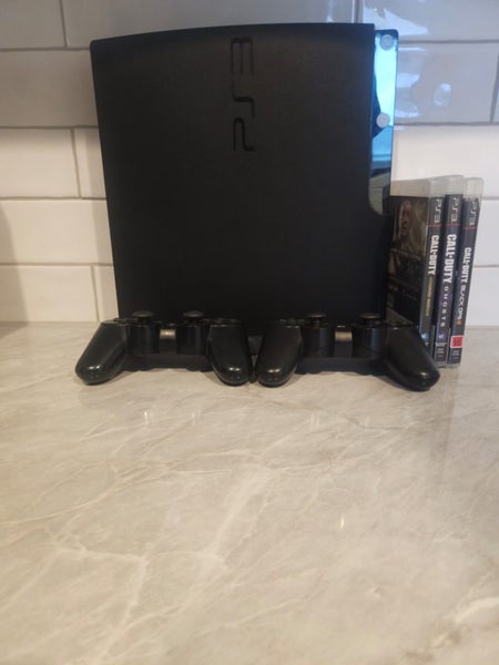 Ps3 Slim Bundle Plus 3 games 2 Controllers Carousel 1